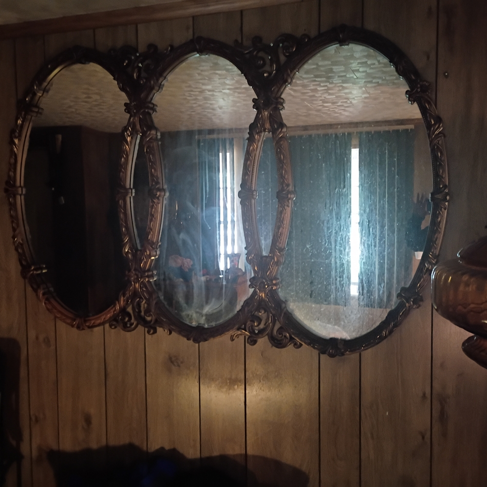 Elegant Triple Oval Mirror with Ornate Brown Frame
